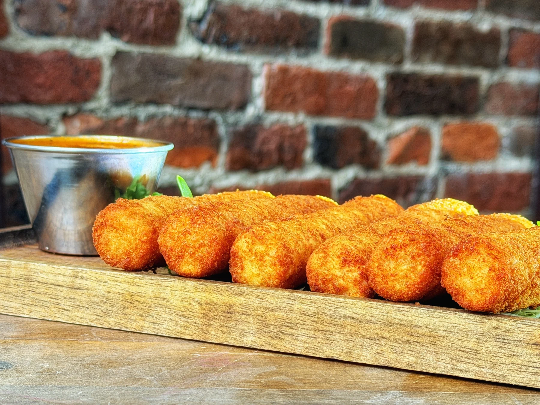 House-made, hand-battered mozzarella cheese sticks.