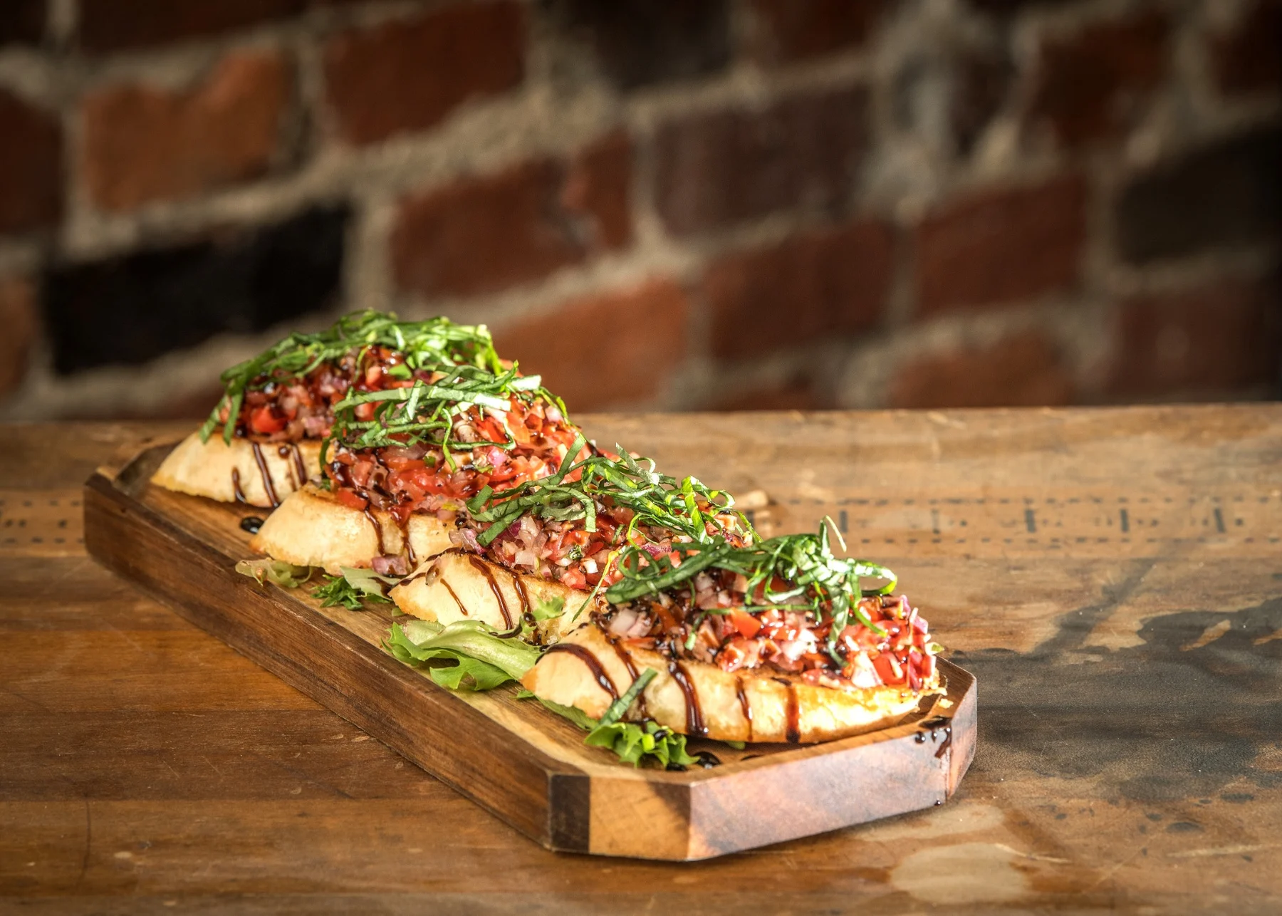 House-made bruschetta with balsamic reduction.
