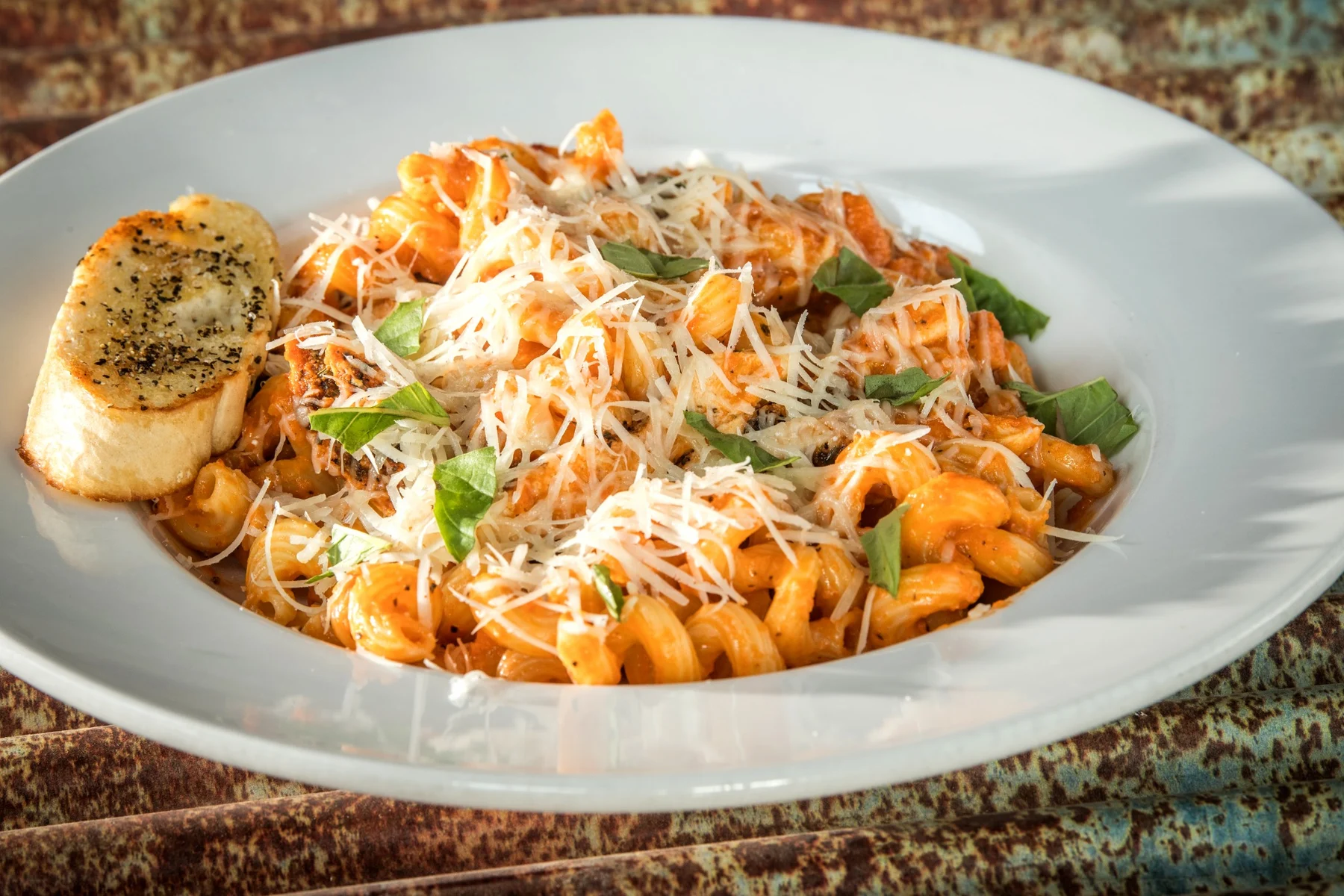 Cavatappi with house-made vodka sauce and grilled chicken.